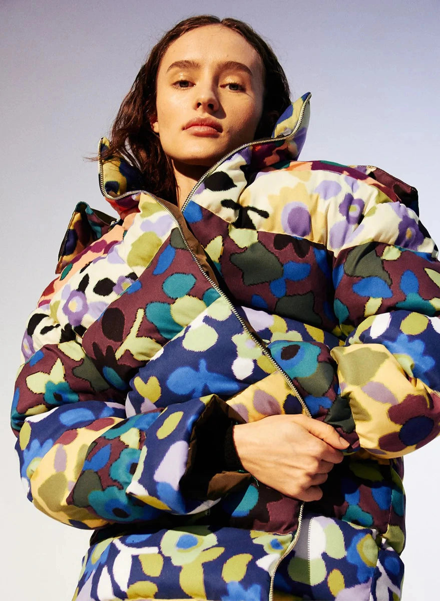 Colorful floral puffer jacket with a detachable hood, featuring bold multicolor patterns and a full front zipper - L