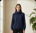 mohair-blend sweater featuring a cozy turtleneck - M