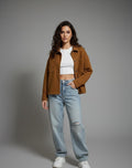 oversized jacket in a warm caramel-brown color. Features a relaxed, simple silhouette made from a thick, cozy fabric. - Small